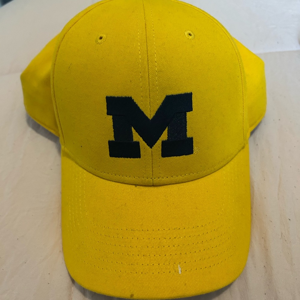 Yellow Cap with Black 'M' Logo
